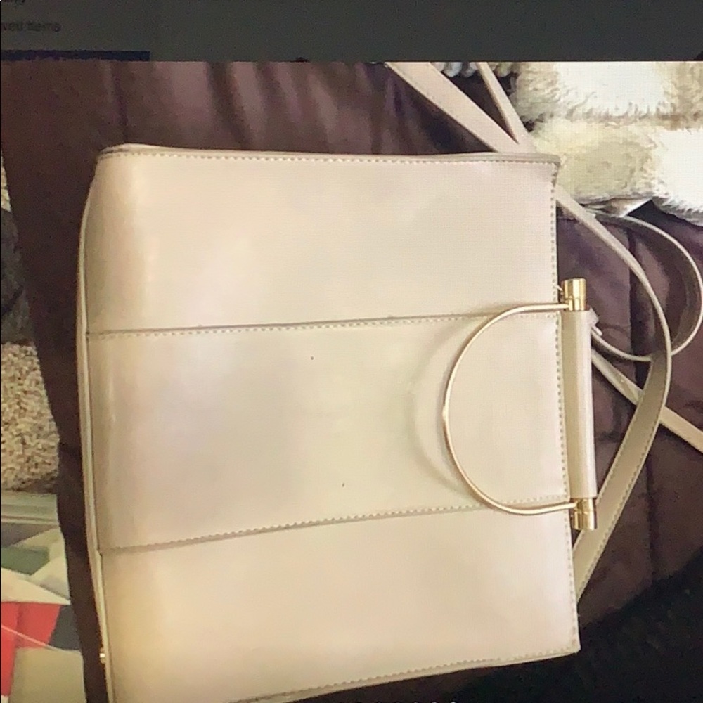 Satchel purse with gold metal handles